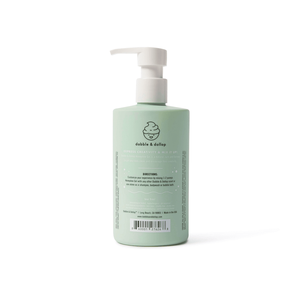 Dabble & Dollop All-Natural Shampoo, Honeydew bottle with white pump, mint-green container ready to dispense.