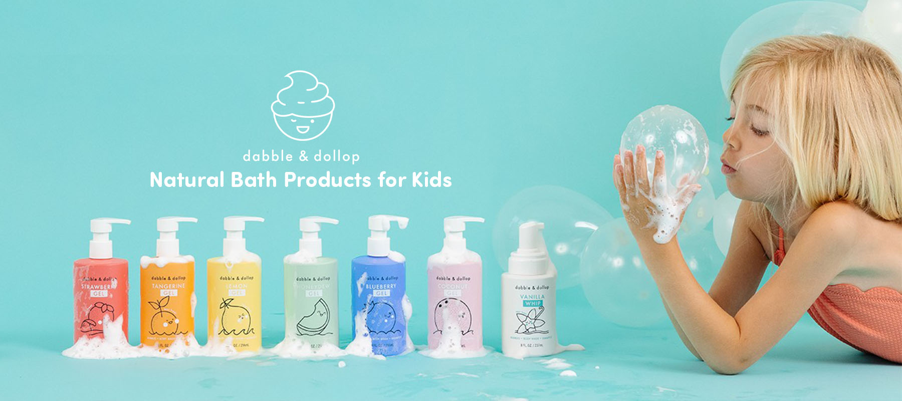Dabble & Dollop natural kids bath products lineup with colorful foaming soap bottles and child blowing bubbles