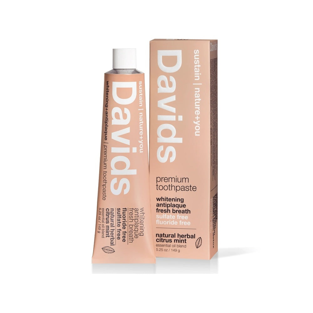 Davids Toothpaste Fluoride Free Herbal Citrus Peppermint tube upright beside peach box, showing whitening and sulfate-/fluoride-free formula.