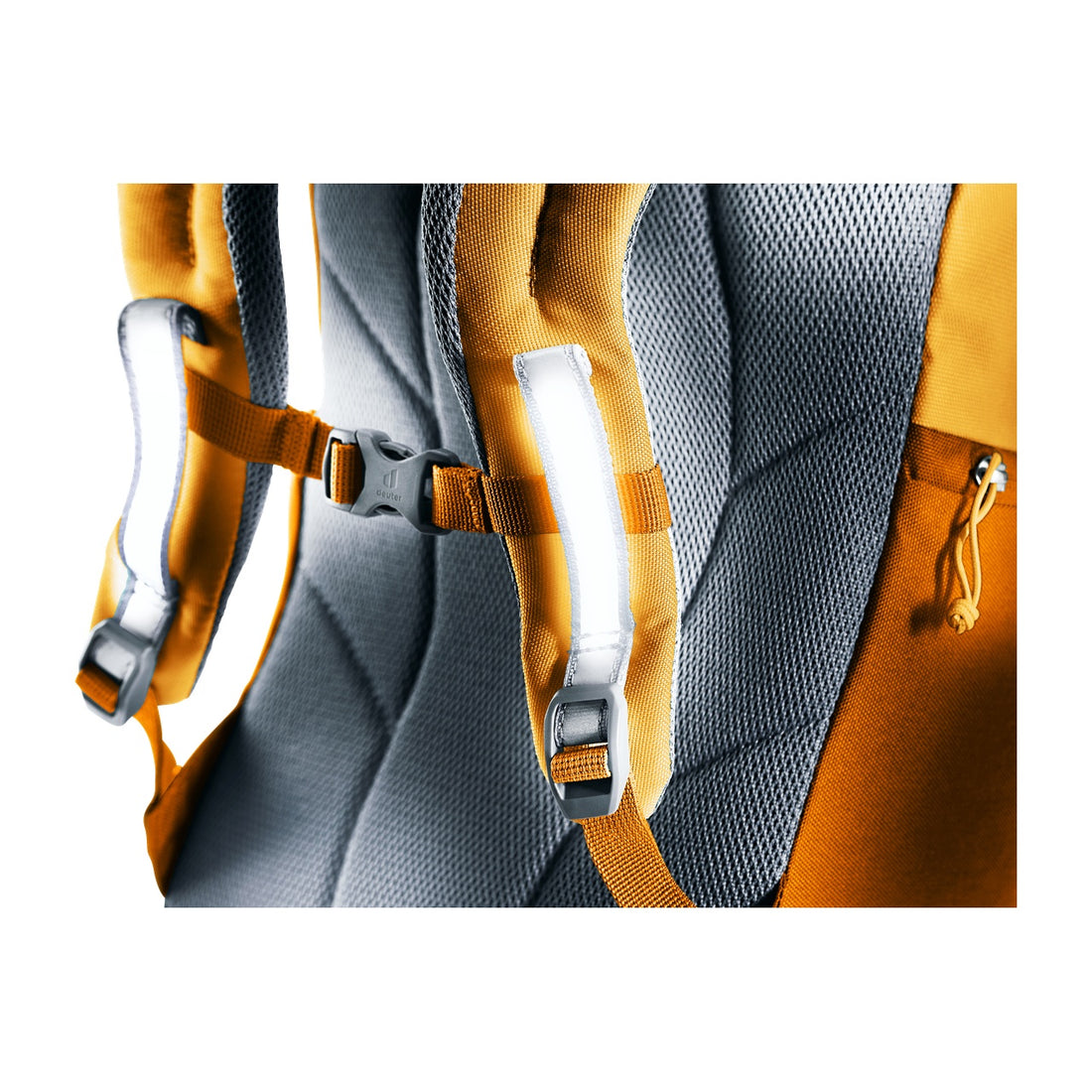 Deuter Waldfuchs 14 Kids' Hiking Backpack in Amber Maple — close-up of reflective panels on shoulder straps