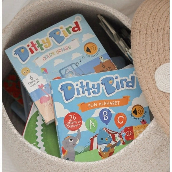 Ditty Bird Sound Book Fun Alphabet USB-C Rechargeable, two colorful boxes in a woven basket.