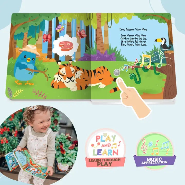 Ditty Bird Sound Book Funny Songs USB-C Rechargeable, vivid jungle scene as a finger taps the page to play music.