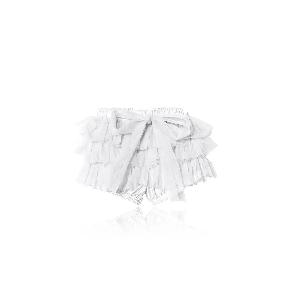 Dolly by Le Petit Tom frilly tutu bloomer pants in off-white, flat-laid with a front bow and ruffles.