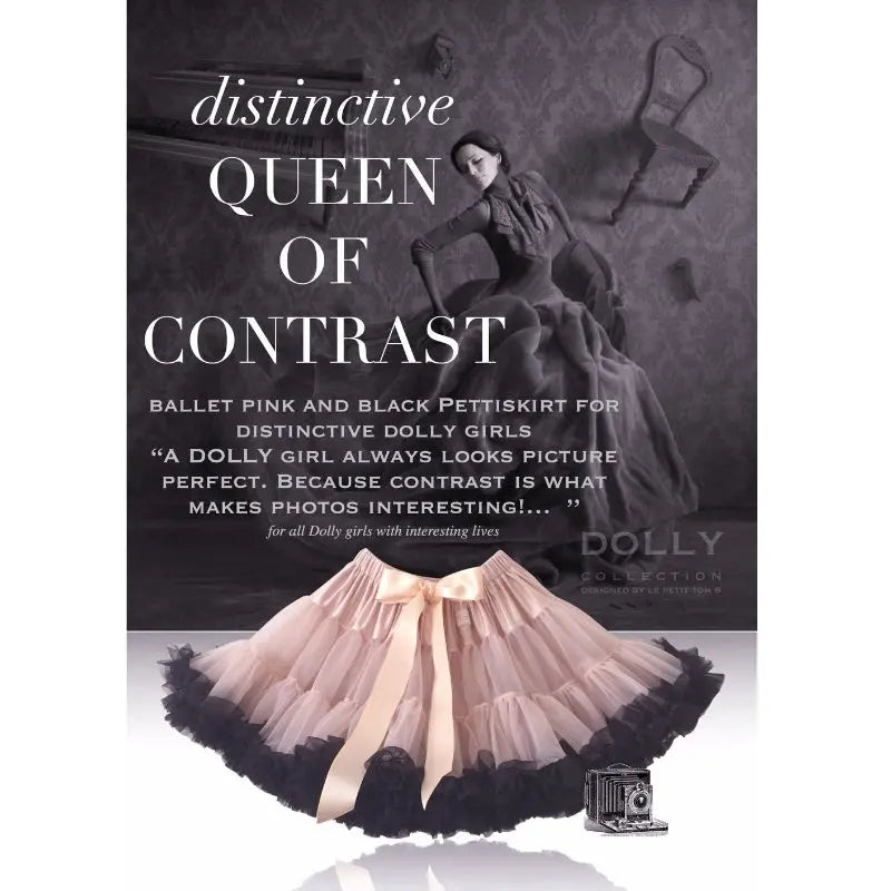 Dolly by Le Petit Tom Pettiskirt Queen of Contrast ballet pink tutu with black trim, spread flat showing satin bow.