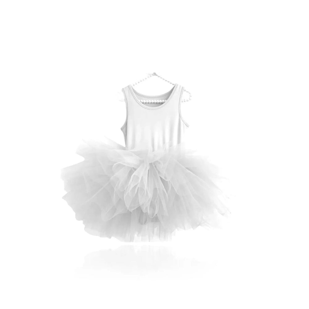 Dolly By Le Petit Tom Timeless Tutu Dress White hung on a hanger with a fluffy tulle skirt