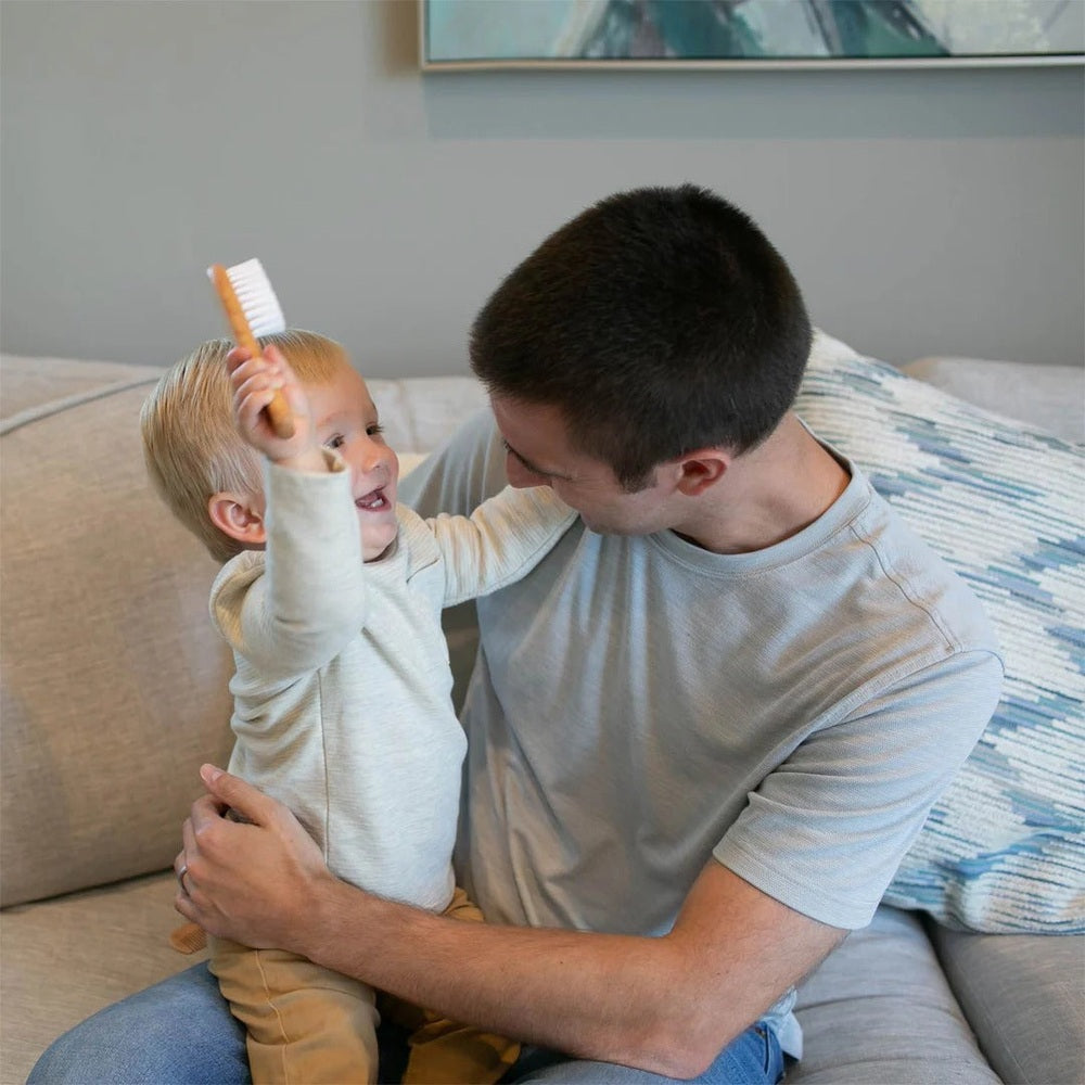 DR. BROWN'S Dr. Brown's Soft and Safe Baby Brush + Comb orange handle with white soft bristles img 2/3