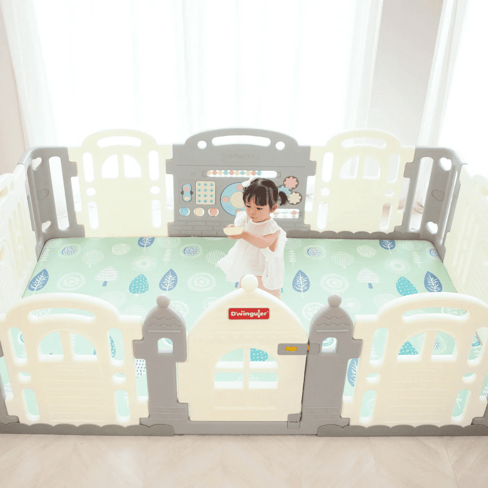 Dwinguler Castle Extension Set Downy Grey play yard with pastel panels and a toddler inside