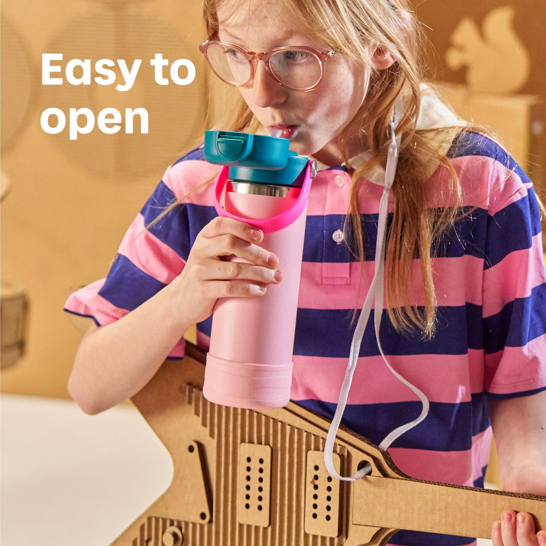 Hydro Flask Kids 12 oz Wide Mouth Bottle With Covered Straw Cap And Boot – Easy-to-open flip-top lid in use