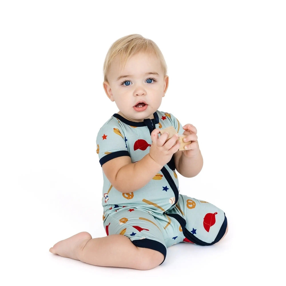 EMERSON AND FRIENDS Emerson And Friends Play Ball Baseball Bamboo Baby Shortie Romper Blue And Multi diagonal zipper with navy trim img 1/4