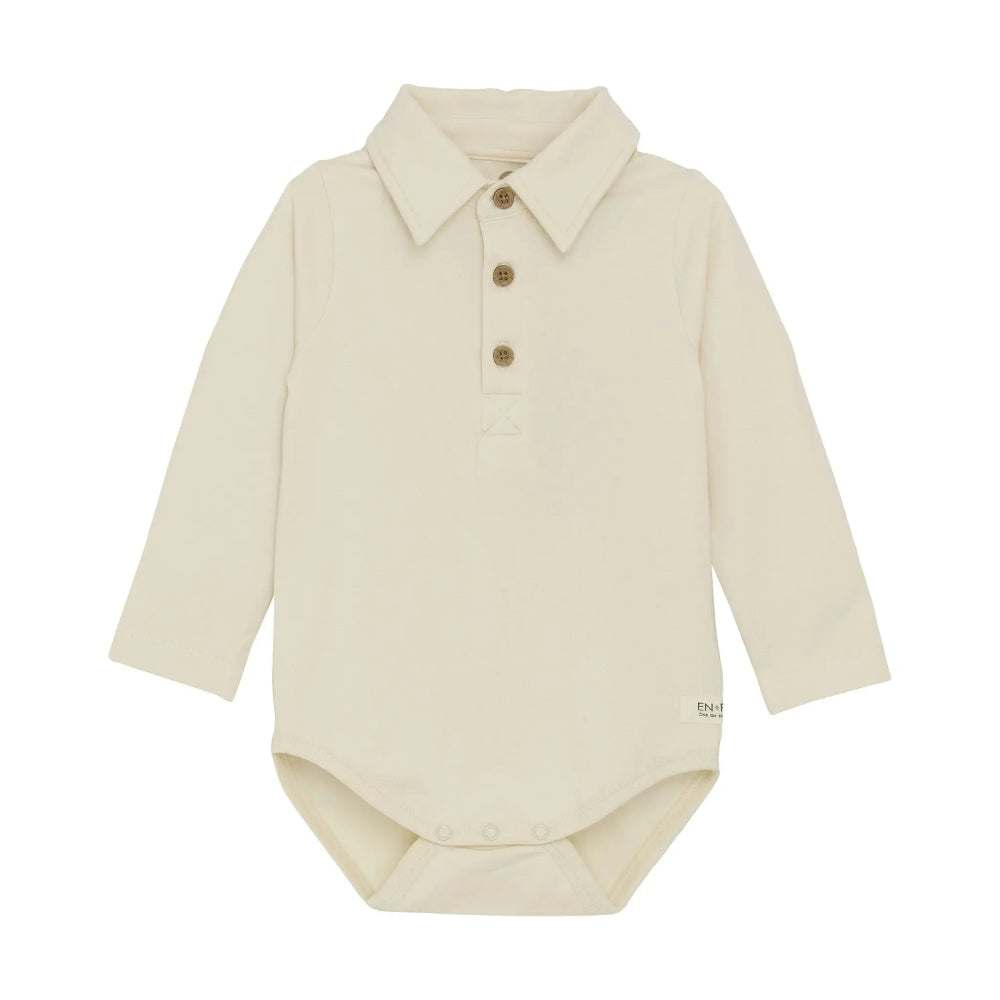 En Fant cream mother-of-pearl long-sleeve baby bodysuit with polo collar and brown buttons