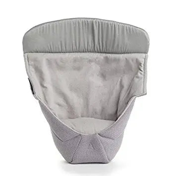 Ergobaby Easy Snug Infant Insert in light gray fabric with padded head support, ready to cradle a newborn in carriers.