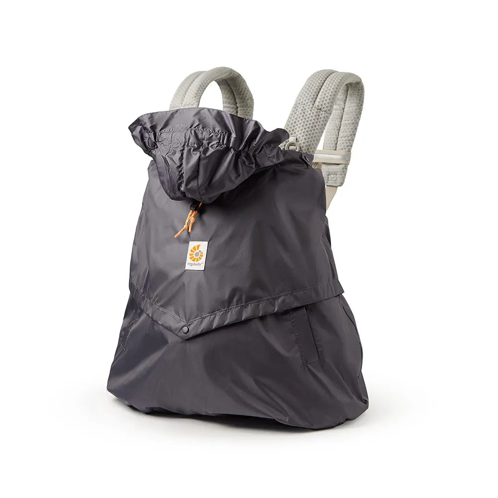 Ergobaby charcoal Rain and Wind Carrier Cover fitted over a light-coloured baby carrier.