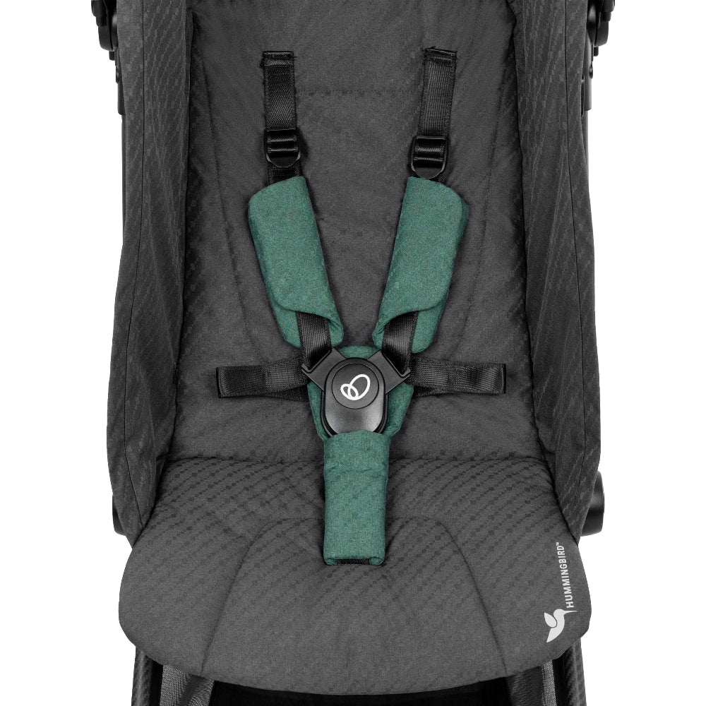 Evenflo Hummingbird stroller harness with green padded straps and black fabric