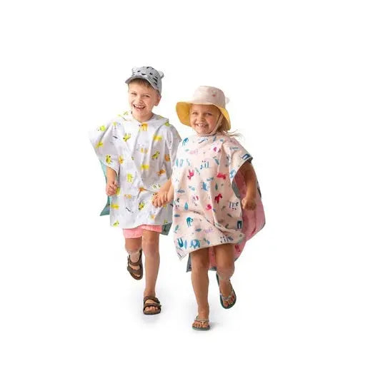Flapjackkids Cover Up Giraffe/Zoo white with colorful animal prints; two kids run wearing them.