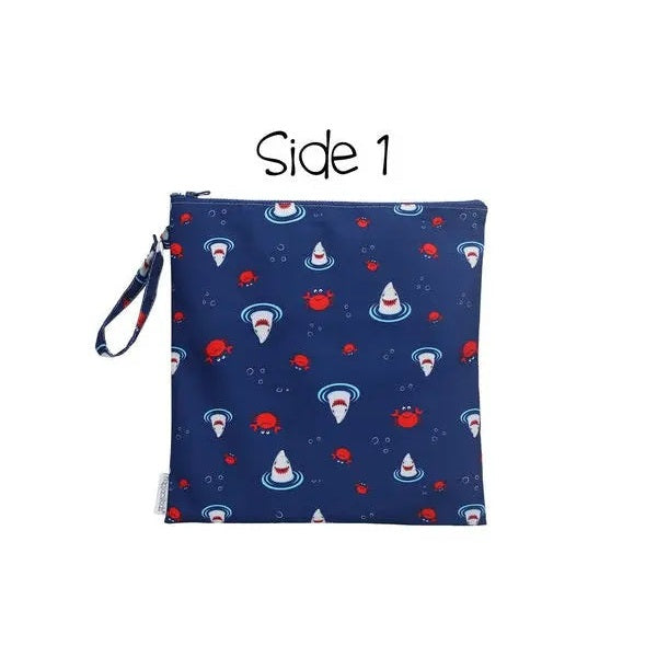 Flapjackkids 2 Sided Wet Bag blue with red crabs and white whirlpools; zipper closure with wrist strap.