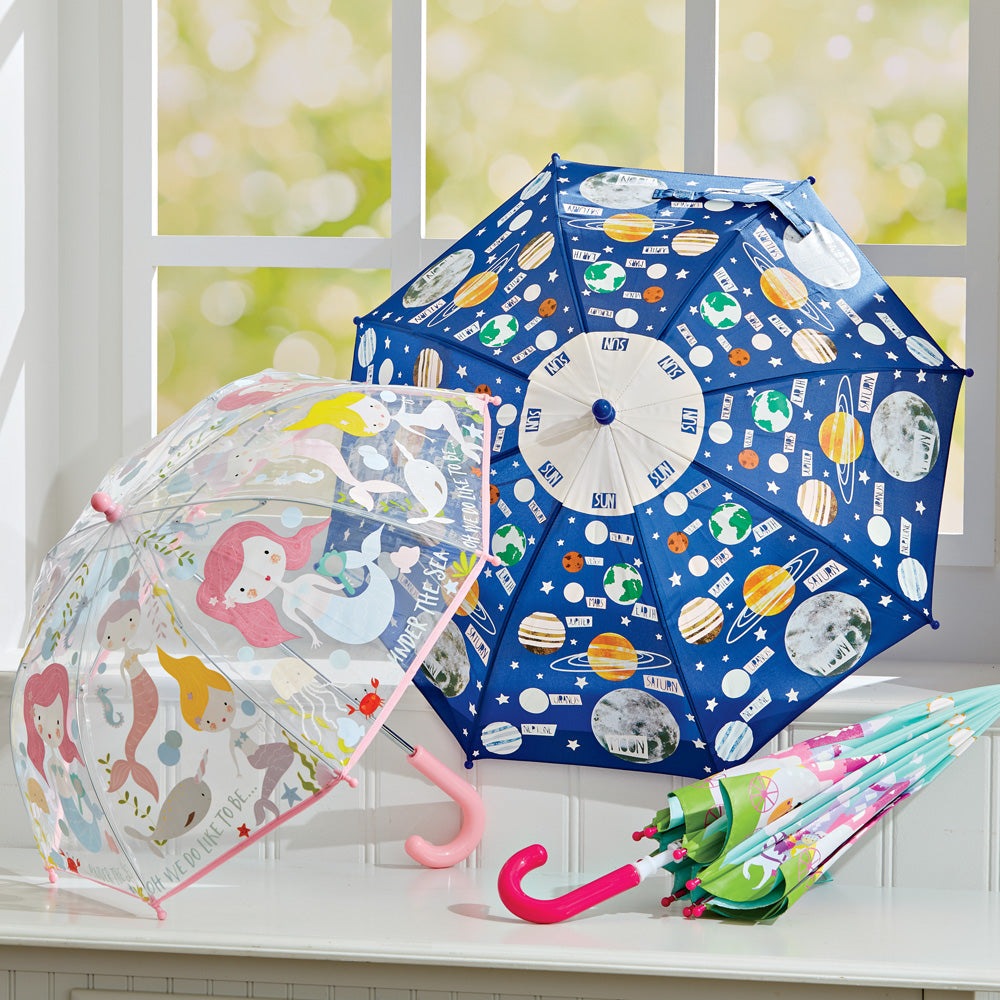 Floss and Rock Universe kids umbrella set of 3; blue space-pattern umbrella and a clear mermaid-themed option.