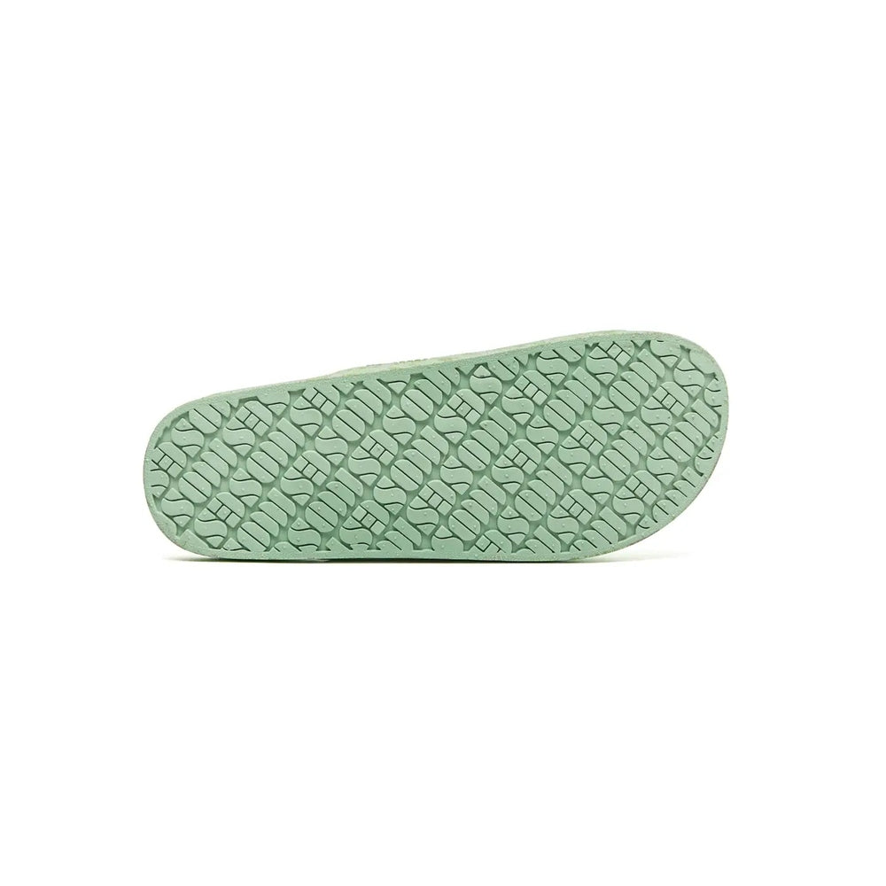 Freedom Moses Prints Adult Smile Sage slipper sole in sage green with textured tread pattern.