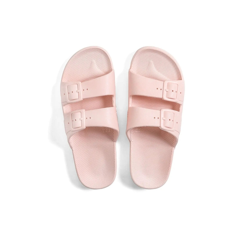 Freedom Moses Prints Pina Rosa pink sandals with two adjustable straps and textured footbed.