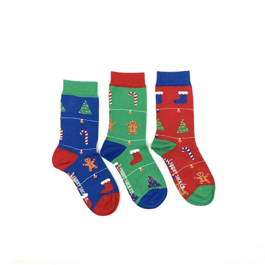 Friday Sock Co. Kid's Ugly Christmas Gingerbread Socks, set of 3 in blue, green, red with gingerbread and candy canes.