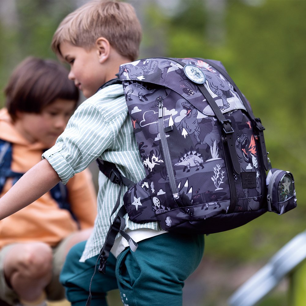 Frii of Norway 22L Dino Black backpack featuring dinosaur print and front pockets
