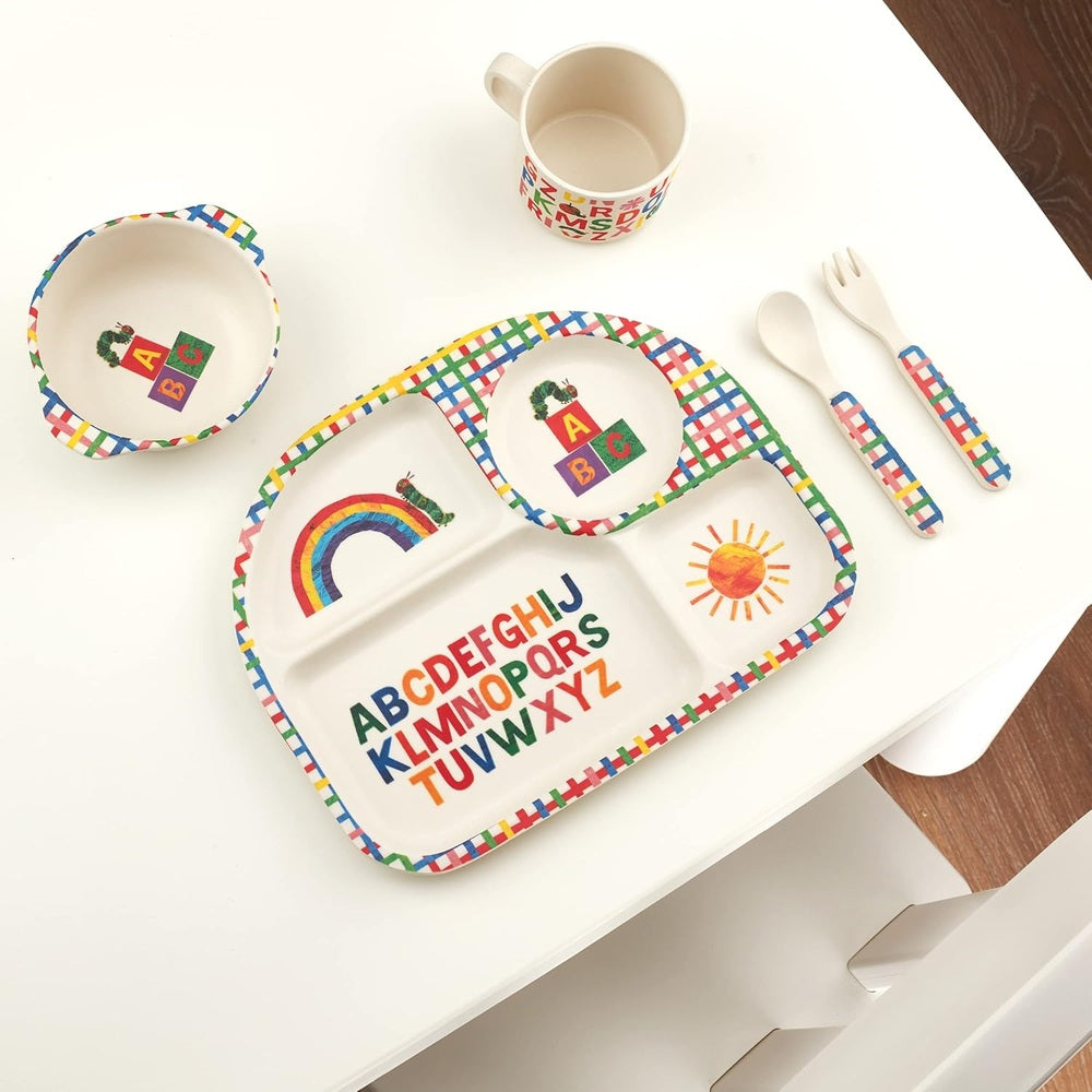 Five-piece children's bamboo dish set with rainbow alphabet print; includes plate, bowl, cup, spoon, fork.