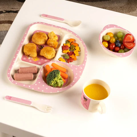 Pink bamboo kids dish set with panda design: divided four-section plate, matching bowl and cup, white utensils.