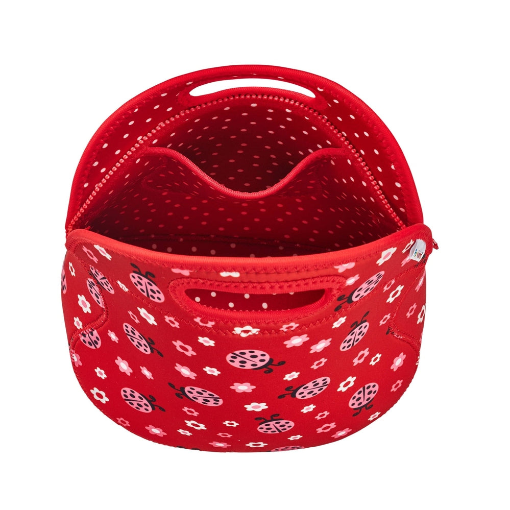 Red insulated lunch bag with pink ladybugs and white flowers, rounded shape, top handle slots, red polka-dot lining.