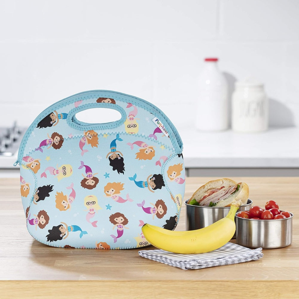 Light blue insulated lunch bag with mermaid print, top handle and zipper, shown with a banana on the counter.