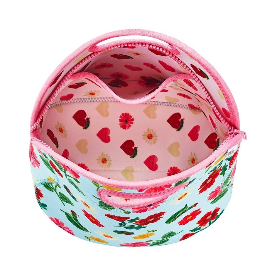 Round pastel blue lunch bag with pink zipper; floral garden print on exterior and pink lining with hearts and flowers.