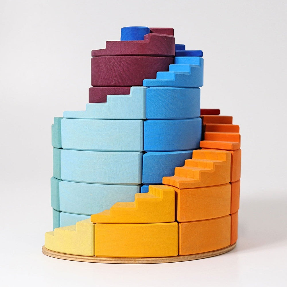 Grimm's Counter Rotating Stepped Spiral 56pc wooden block set in rainbow colors