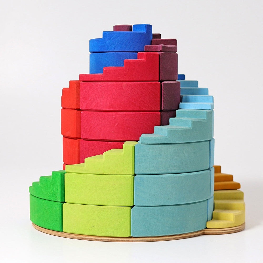 Grimm's Counter Rotating Stepped Spiral 56pc wooden block set in rainbow colors