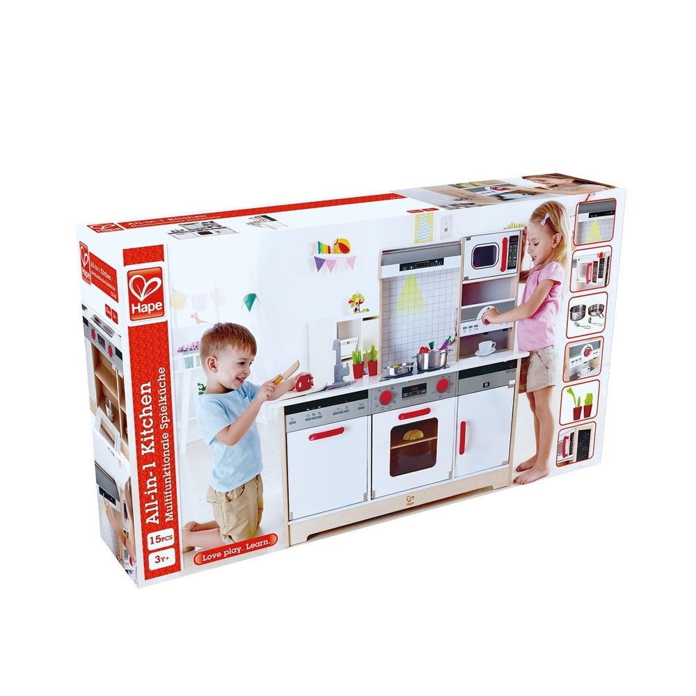 Hape All-In-1 Kitchen wooden toy set with stove, oven and sink in white/red; kids happily cook and wash dishes.
