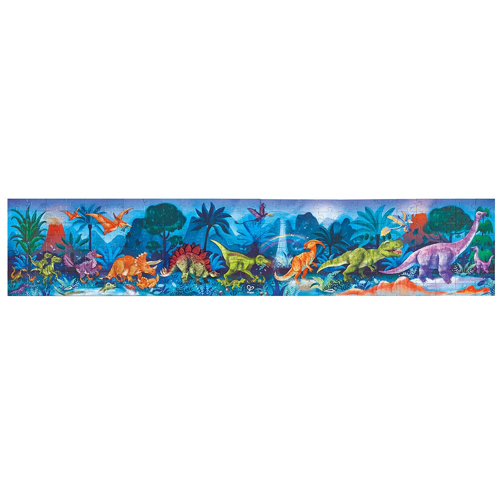 Hape dinosaur glow-in-the-dark puzzle featuring a vibrant blue prehistoric jungle scene for kids