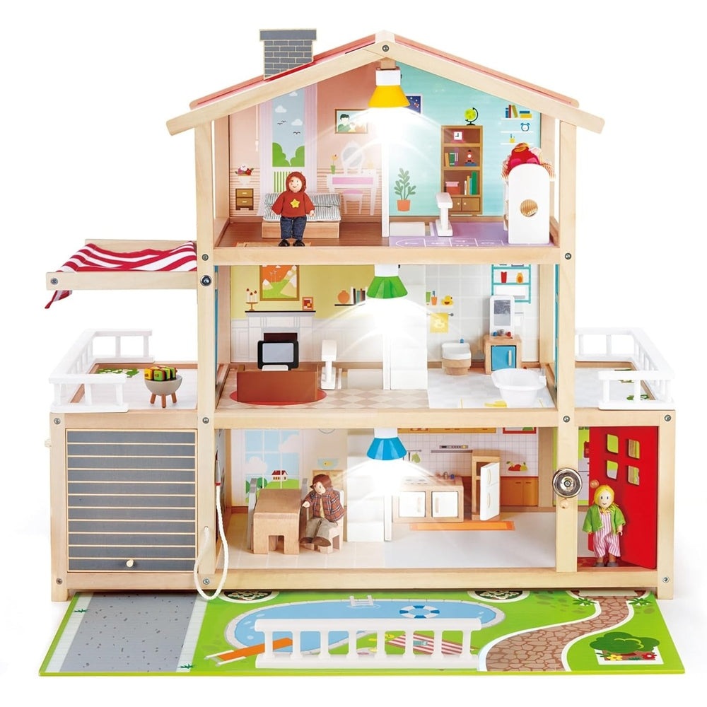 Hape Doll Family Mansion wooden dollhouse with three floors, colorful rooms, and posed figures in each scene.