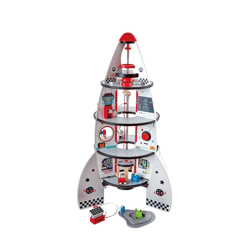 Hape Four-Stage Rocket Ship toy with red accents and space panels, where a child spins the central dials to activate each tier.