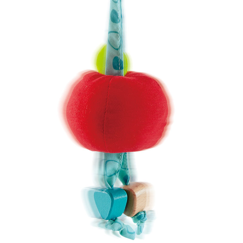 Hape Garden Friends Play Arch plush red apple with teal beads and wooden accents.