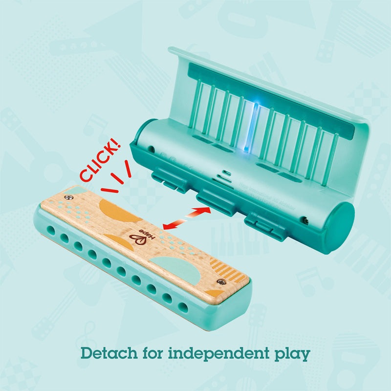 Hape Learn With Lights Harmonica; teal plastic harmonica with wooden mouthpiece and illuminated lights