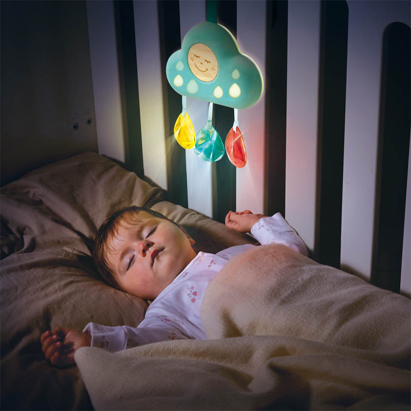 Hape Musical Cloud Light over crib; teal cloud with colorful crystal charms soothing night glow, 1 baby sleeping