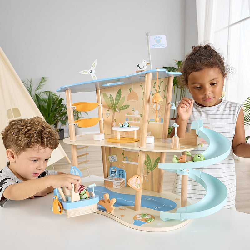 Hape Ocean Rescue Playset, wooden multi-level seaside toy with a blue spiral slide and tiny boats