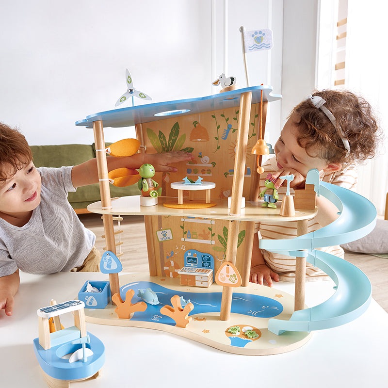Hape Ocean Rescue Playset wooden multi-level sea adventure with blue spiral slide and mini vehicles