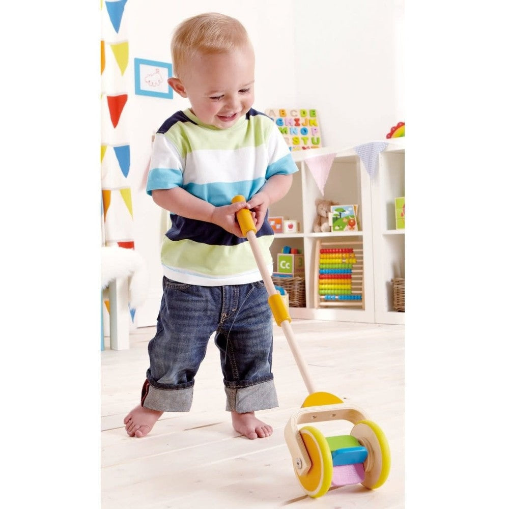 Hape Push Toy Rainbow: wooden push-along with colorful beads, toddler indoors