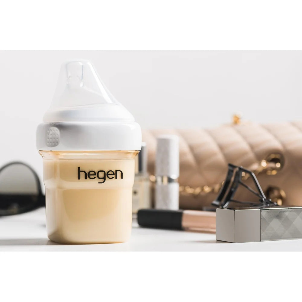 Hegen feeding bottle in a softly lit tabletop scene