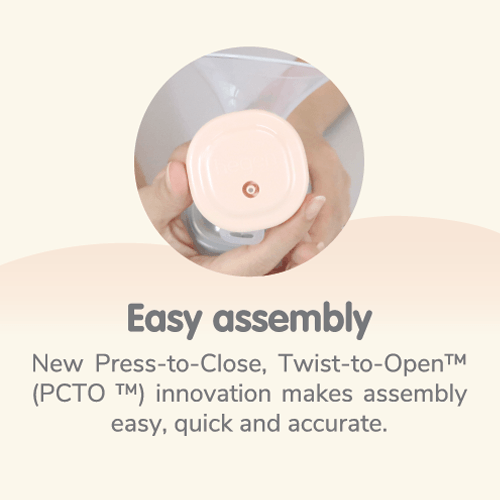 Hegen Pcto Manual Breast Pump Kit Softsqround in pink, showing hands twisting the easy-to-open cap for assembly.