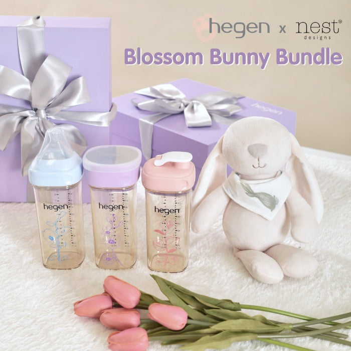 Hegen Blossom Bunny Bundle: three baby bottles with pastel lids, plush bunny, and pink tulips