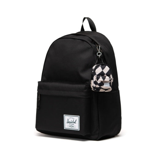Herschel Classic Backpack Bag Charm in Warp Check, shown attached to a black backpack.