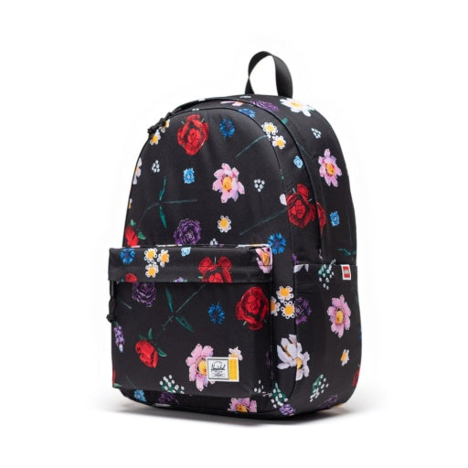 Herschel x LEGO Classic XL Backpack in Falling Florals, three-quarter side view.