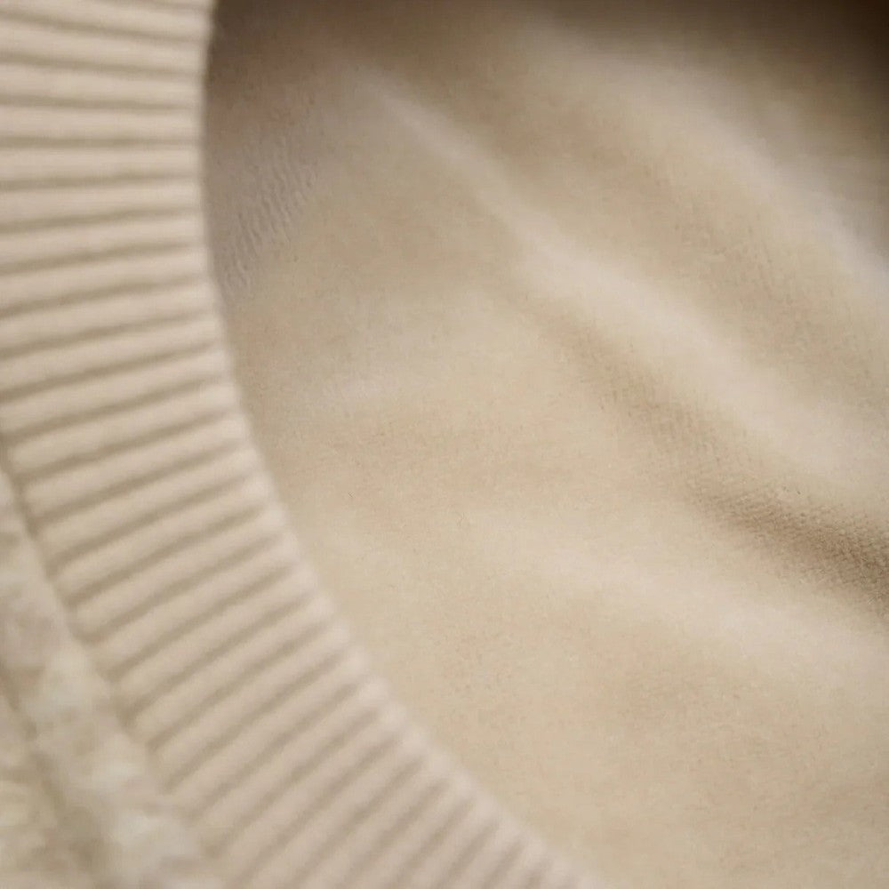 Brown sand melange wool balaclava for babies, close-up of soft knit with ribbed edge.
