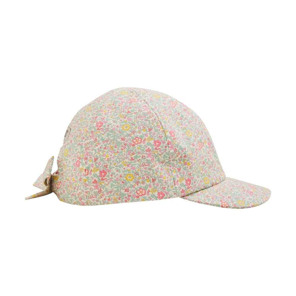 HUTTELIHUT Huttelihut Cap in Liberty Fabric Double Cream Side tie bow detail with curved brim and paneled crown img 3/5