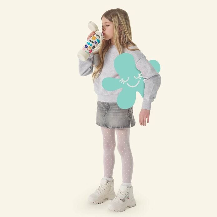 Hydro Flask Kids 18 oz Wide Mouth Bottle With Covered Straw Cap And Boot – Daydream White lifestyle view 1