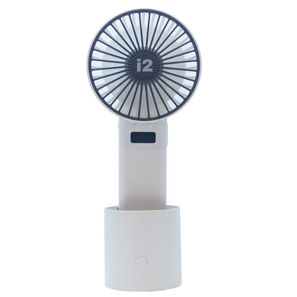 I2 Handheld 5 Speed Lithium Battery Fan in white perched on its compact dock, ready for portable cooling